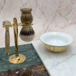 Display of brush razor bowl and stand on marble