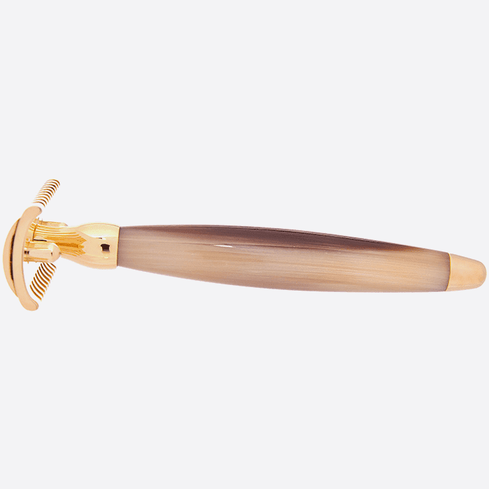Plisson gold and horn razor side